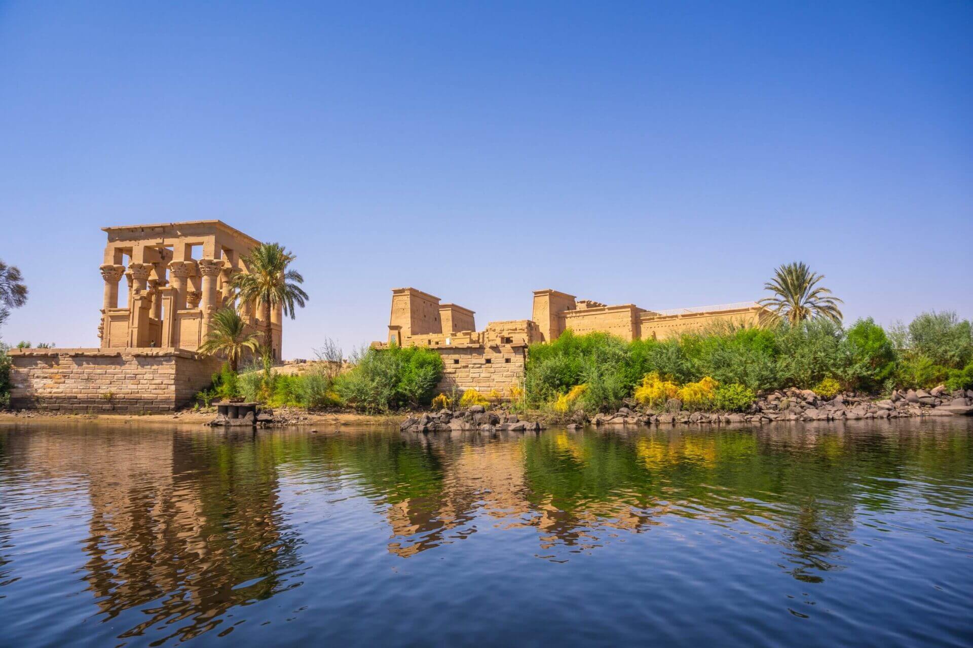 the-beautiful-temple-of-philae-and-the-greco-roman-buildings-seen-from-the-nile-river-a-temple-dedicated-to-isis-goddess-of-love-aswan-egyptian-stockpack-istock