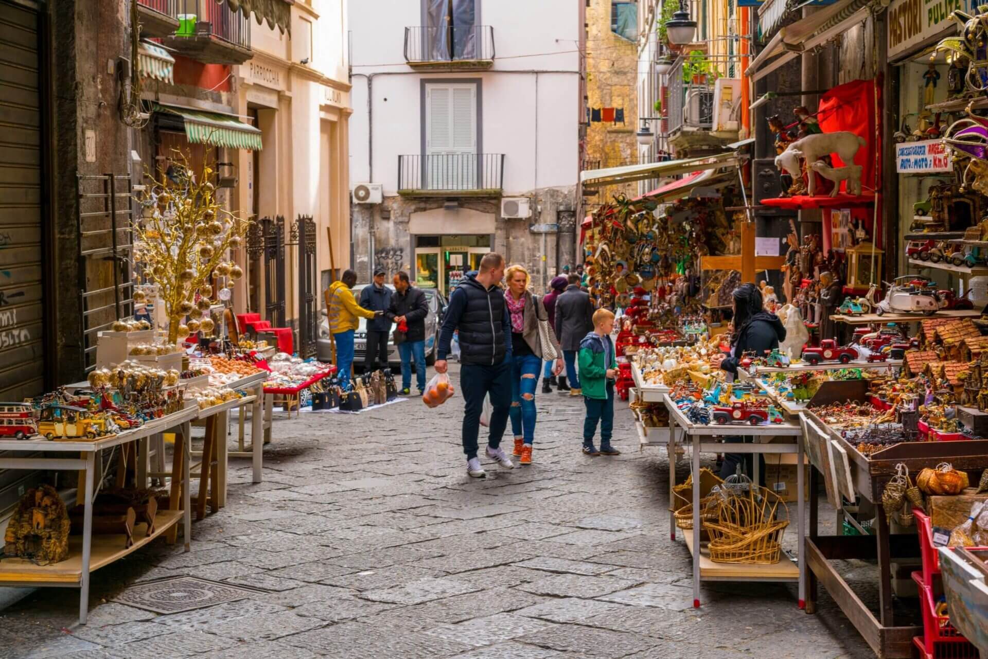 naples-italy-february-27-2016-people-along-the-via-san-gregorio-armeno-a-street-famous-for-its-artisan-shops-selling-nativity-displays-in-naples-italy-stockpack-istock